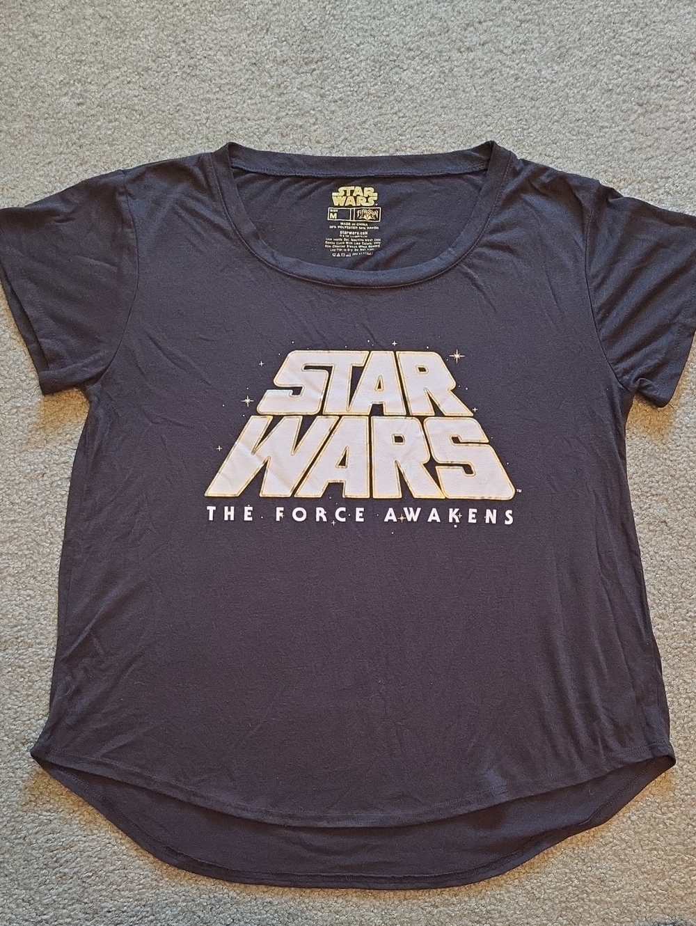 Star Wars Women's Black Graphic Tee with Gold Logo Size medium